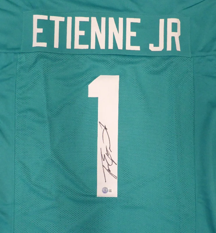 Rugby Helmet For High-Profile Competitions-Jacksonville Jaguars Travis Etienne Autographed Teal Jersey Beckett BAS QR #W713279